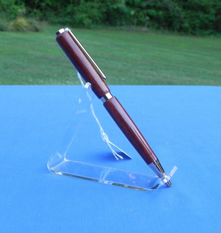 Another style of slim pens, this one has very straight wood sections made from an unknown dark wood.