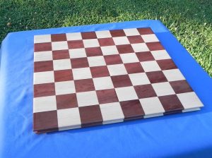 Rosewood and maple chess board.