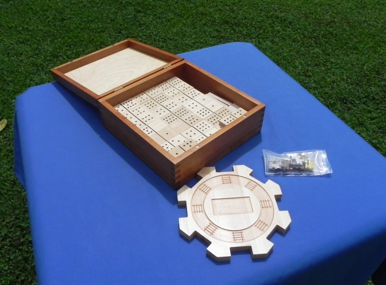 Box packed with Mexican Dominoes and parts