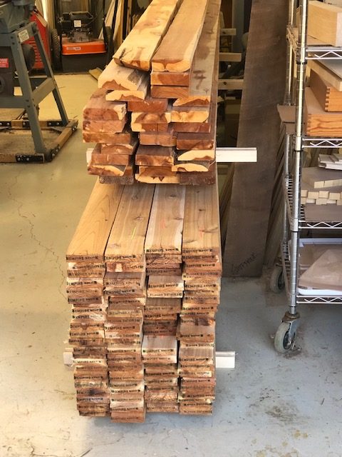 Rough Lumber. Eastern Red Cedar on top, Western Red Cedar on the bottom of the stack.